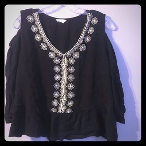 Black with white design blouse.